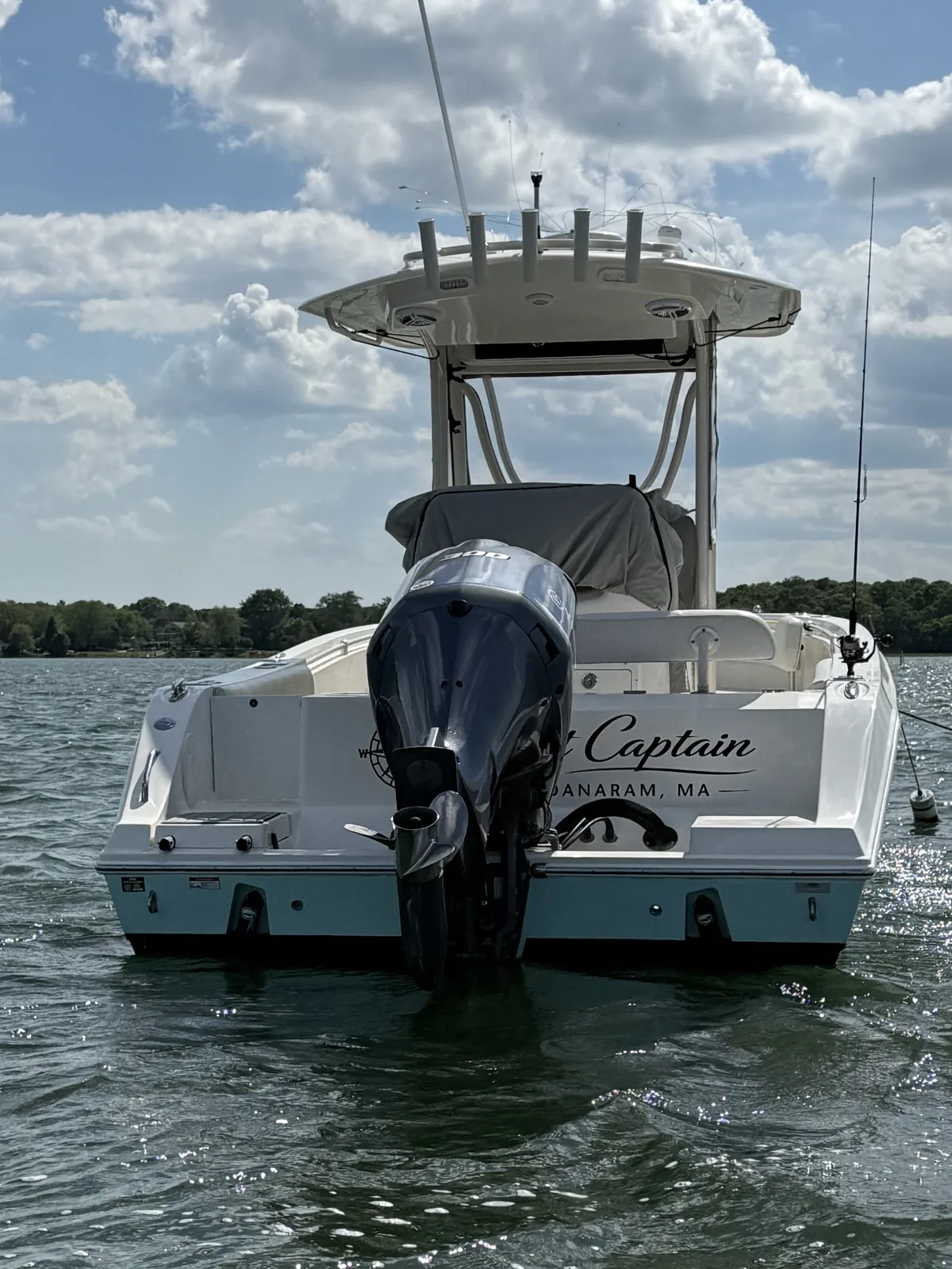Stern view of the Last Captain boat in Padanaram